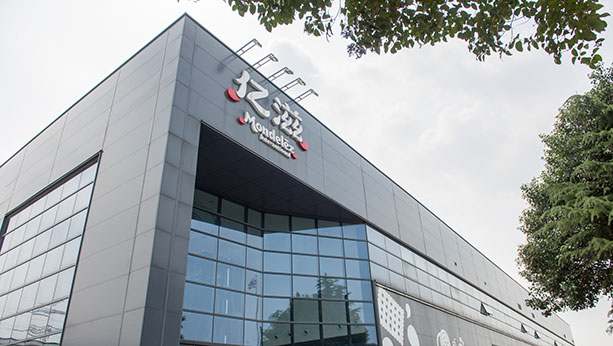 Outside shot looking up at a Mondelez office building in Asia